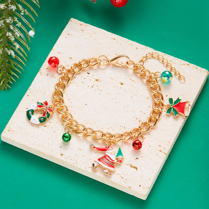 Kerst armband met kerstman sneeuwpop ster en kerstboom hanger