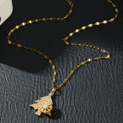 Kerst ketting met fonkelende sneeuwvlok en kerstboom hanger vol zirkonia