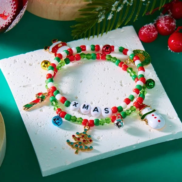 Kerst armband met kerstman sneeuwpop ster en kerstboom hanger