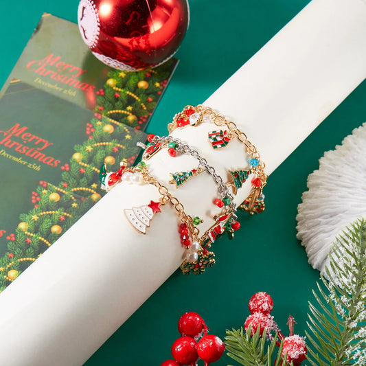 Kerst armband met metalen schakels, kerstman, sneeuwvlok en parels